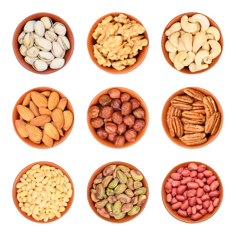 different-types-of-nuts-pistachios-walnuts-cashews-almonds-hazelnuts-pecans-pine-nuts-105758927